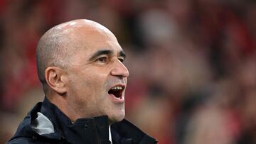 Portugal's Spanish head coach Roberto Martinez reacts during the UEFA Nations League quarter-final, first-leg football match Denmark v Portugal at the Parken Stadium in Copenhagen on March 20, 2025. (Photo by Jonathan NACKSTRAND / AFP)