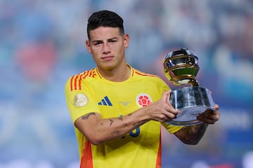 James Rodriguez of Colombia poses with the trophy for best player during Final match between Argentina and Colombia as part of CONMEBOL Copa America USA 2024 at Hard Rock Stadium on July 14, 2024 in Miami Gardens, Florida, United States.