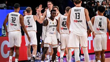 Germany's Dennis Schroder (C) reacts during the FIBA Basketball World Cup group K match between Germany and Slovenia at Okinawa Arena in Okinawa on September 3, 2023. (Photo by Yuichi YAMAZAKI / AFP)